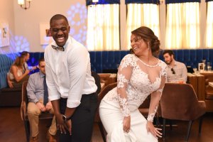 Newlyweds dancing at a wedding reception