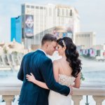 Wedding couple overlooking Bellagio fountains