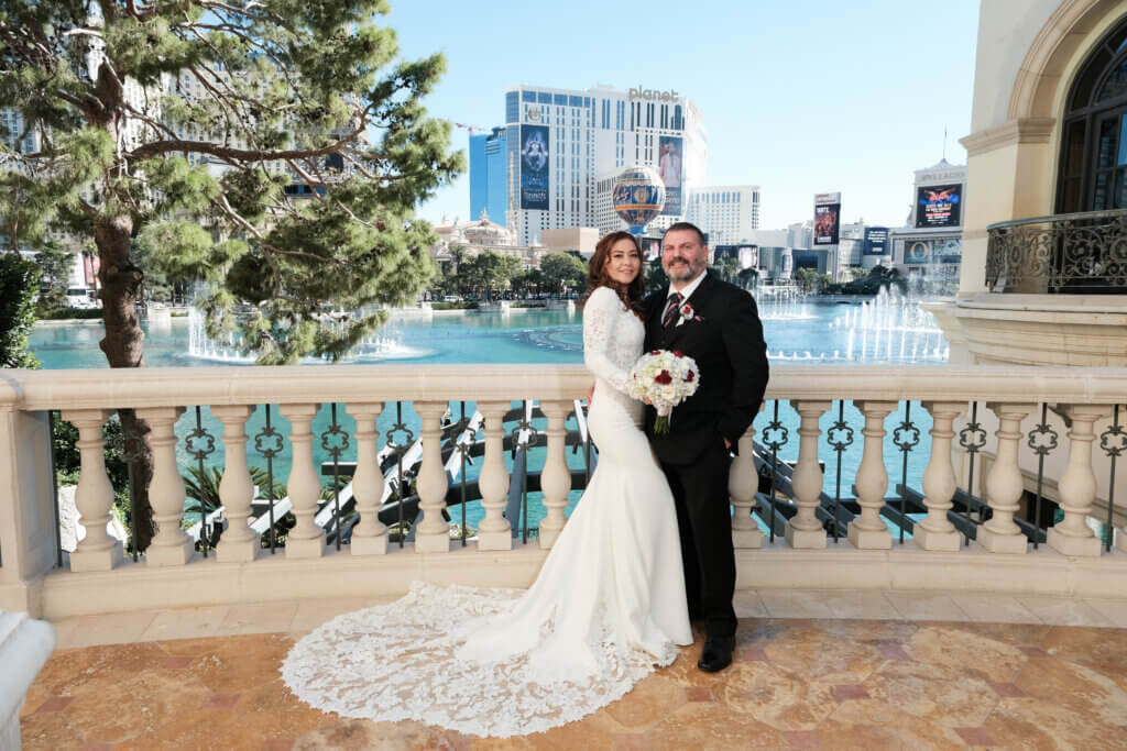 Bellagio fountain with a married military couple