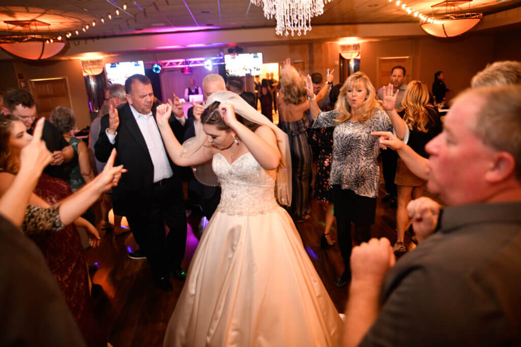 a full wedding party dancing