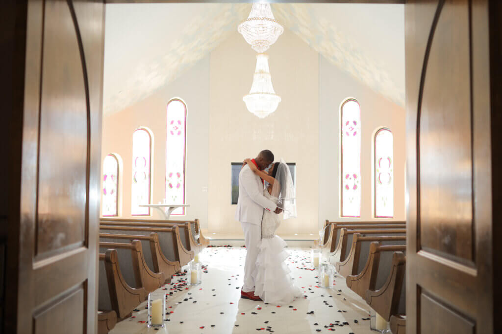 a couple embracing in a chapel