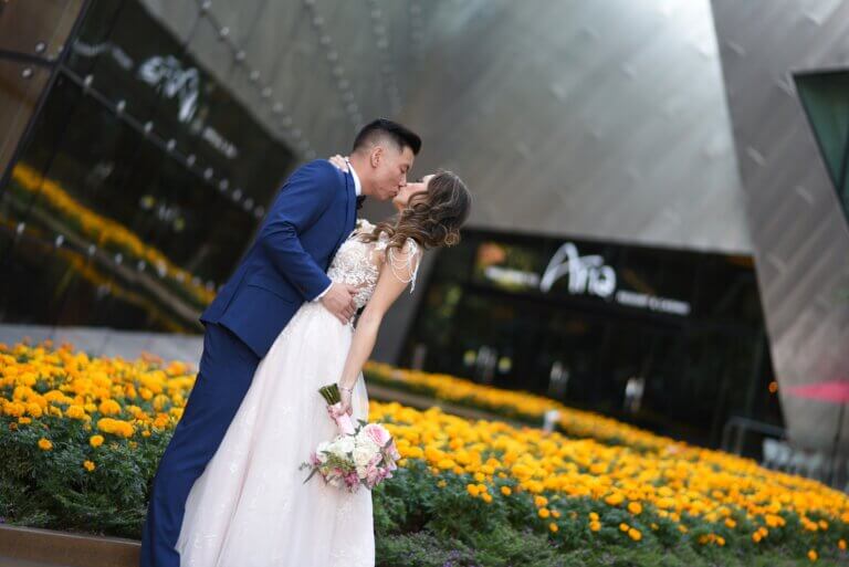 a wedding kissing photo at Aria