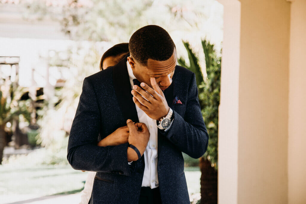 a groom waiting to see his bride