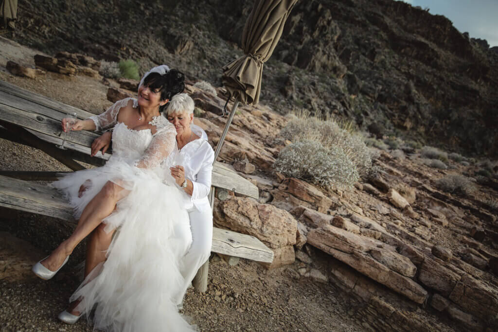 two brides at a desert wedding