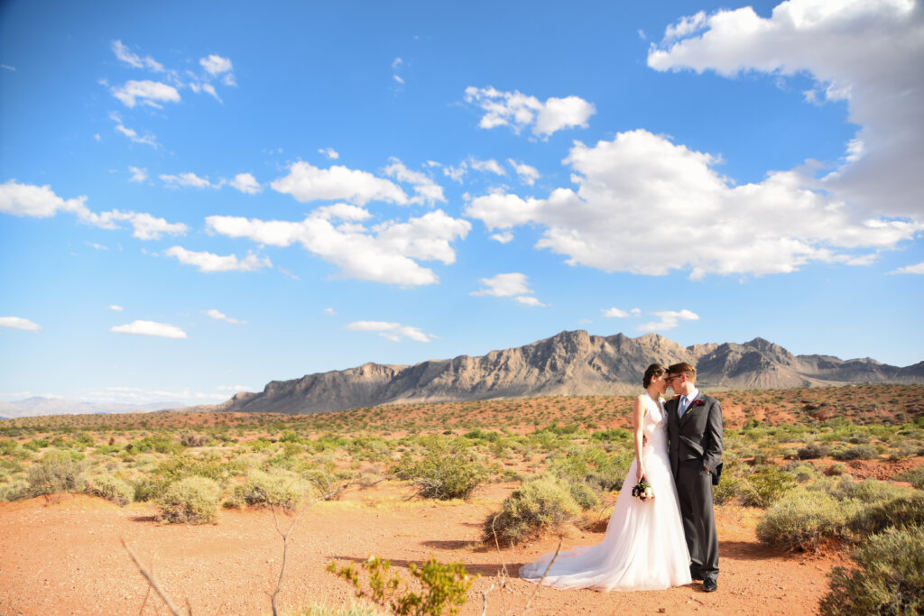 a couple standing at Red Rock Canyon on their wedding day