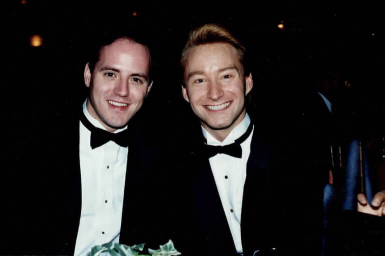two men in tuxedos with bow ties