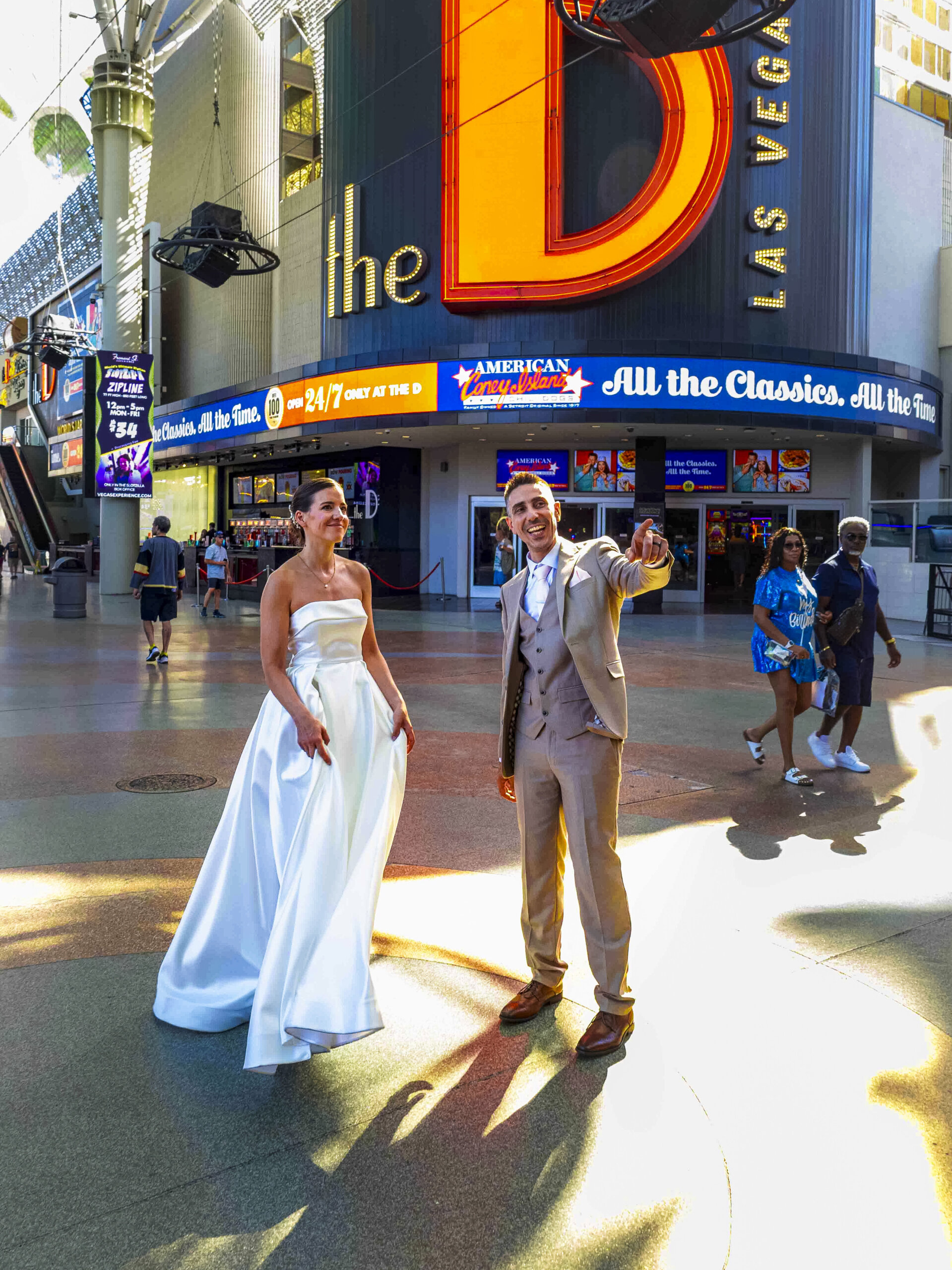 a wedding couple in front of The D hotel in Las Vegas