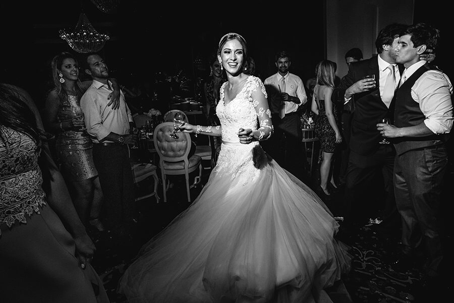 a woman dancing in a white dress